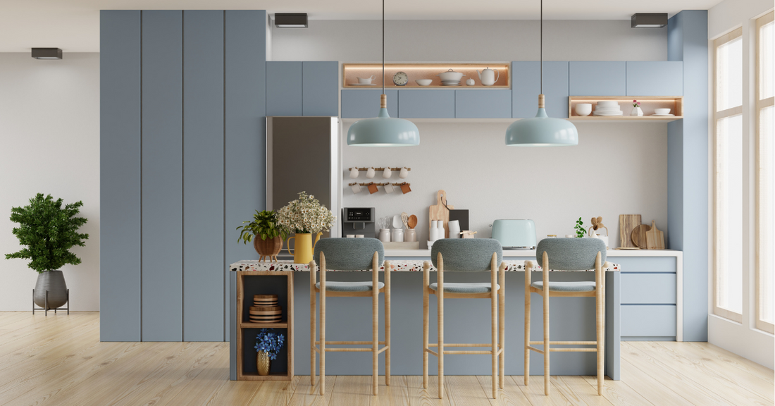 A stylish kitchen in pastel blue, showcasing elegant design and modern aesthetics, perfect for a serene cooking environment.
